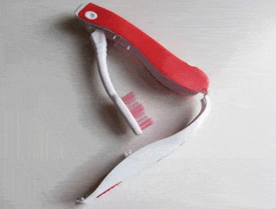 Colgate Foldable Travel Toothbrush in action