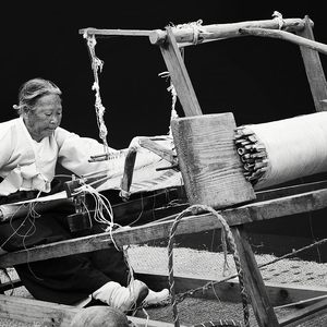 South Korean woman weaving ramie yarn