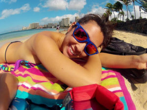 Woman sunbathing on beach