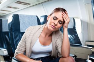 Air sick woman on a flight