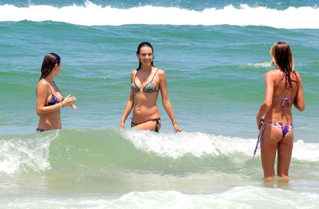 women on beach in brazil