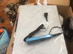 blue BaBylissPRO Nano Titanium Mini Straightening Iron on table unpacking